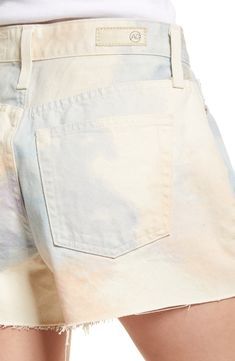 A cloudy design in pastel hues brings dreamy vibes to these high-waist nonstetch shorts punctuated with raw hems. 3 1/2" inseam, 13" leg opening, 11 1/2" front rise, 15" back rise (size 29) 100% cotton Machine wash, tumble dry Imported Spring Acid Wash High-waisted Shorts, Trendy Bleached Cotton Shorts, Trendy Faded Cotton Shorts, Spring Tie Dye Bleached Bottoms, Faded High Waist Spring Shorts, Cotton Bleached Short Length Bottoms, Relaxed Fit Faded Shorts For Spring, Faded Cotton Shorts For Spring, Spring Cotton Faded Shorts