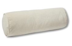 a pillow that is on top of a white surface and has a zippered closure