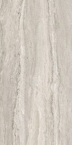 a close up view of a white marble tile wallpaper with wavy lines on it