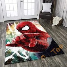 a room with a rug that has a spiderman on it