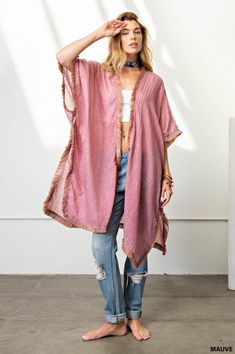 Experience the ease and elegance of our fringe trim kimono. Crafted from a light-weight, soft fabric, this versatile cover-up is perfect for any event. Perfectly suited for dressy occasions and both day and night events, the kimono offers a flattering, loose fit that can be dressed up or down, worn over shorts, jeans, or a beautiful dress. Enjoy the fun and beauty of the fringe trim for an effortless look. Cozy Lifestyle, Wing It, Red Barn, Shorts Jeans, Fringe Trim, Day And Night, Signature Style, Fashion Advice, Soft Fabric