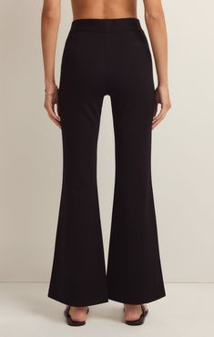 We love a good flare pant and the Do It All Flare Pant has it all! This chic high rise pant features a slim fit throughout the hips, a kick flare, and our fave detail; the supportive feel from the durable, stretchy fabric. Z SUPPLY Women's Do It All Flare Pant, Black, Extra Small Chic Flare Yoga Pants, Black Flare Loungewear Pants, Black High Rise Fitted Flares, Black Stretch High-waisted Flares, High Waist Black Elastane Flares, Chic High Rise Black Flares, Chic Mid-rise Black Flares, Chic Black Mid-rise Flares, Sleek Flare Bottoms For Night Out