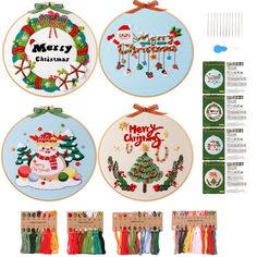 cross stitch kits with christmas designs on them