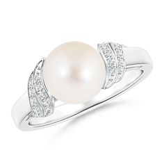 ANGARA Product_Description:- Enchanting like the bright full moon, the Freshwater cultured pearl sits pretty on a Silver band. The diamond-studded swirls on the shoulders enhance this elegant and round pearl ring with a dose of sparkle. For a sophisticated look, the shimmering diamonds are pavé set on this pearl solitaire ring.. # About the Gemstone:- Freshwater cultured pearls exude classic charm that goes beyond the trends. Symbolizing purity, clarity and wisdom, this beautiful gem is celebrat Swirl Diamond Ring, Swirl Ring, Freshwater Cultured Pearls, Pearl Ring, Cultured Pearls, Silver Band, Solitaire Ring, Full Moon, Stone Rings