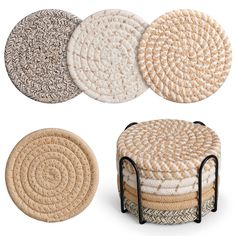 four different types of round rugs with black metal stands on each side and one is white, the other beige