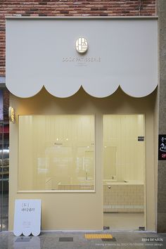 an empty store front with the door open