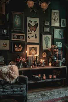 a living room filled with lots of pictures and candles