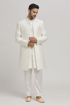 White sherwani with thread quatrefoil embroidery. Paired with an inner embroidered kurta and pant. - Aza Fashions Elegant Nehru Jacket For Traditional Ceremonies, Elegant Nehru Jacket For Diwali Ceremonies, Elegant Nehru Jacket For Eid And Traditional Ceremonies, Elegant Nehru Jacket For Eid Ceremonies, Fitted Nehru Jacket With Chikankari For Traditional Ceremonies, Fitted Nehru Jacket With Chikankari Embroidery For Traditional Ceremonies, Open Sherwani Men, Open Sherwani, White Sherwani