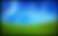 an abstract blurry background with blue and green colors