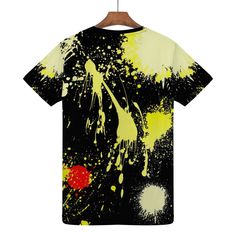 a t - shirt with yellow and black paint splattered on it