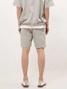 Editor's NotesCity Boy Banding Shorts Mint Grey from FANACULT is a wide-fit shorts with pleated details. Can be worn as a set with the City Boy String Over Fit T-shirt.- 40% Polyester, 60% Cotton- Bio-washed- Wrinkle free- Key ring detail- Pocket details- String at waistMeasurements (in.)- Size: M / L / XL- Length: 19.2 / 19.6 / 20.0 in.- Waist: 16.5 / 17.3 / 18.1 in.- Hip: 20.4 / 21.6 / 22.8 in.- Inseam: 5.9 / 5.9 / 5.9 in.- Hem: 10.6 / 11.4 / 11.8 in.*Model InformationHeight: 6'0 Weight: 149.9 Size: MComposition & Care- 40% Polyester, 60% Cotton- Dry Clean OnlyDesigner- by FANACULT Sporty Summer Cargo Shorts, Casual Summer Cargo Shorts With Elastic Waistband, Casual Cargo Shorts For Spring, Cotton Cargo Shorts With Elastic Waistband For Spring, Casual Bermuda Cargo Shorts For Spring, Casual Cargo Shorts For Summer, Spring Cotton Cargo Shorts With Elastic Waistband, Spring Knee-length Cargo Shorts, Sporty Bermuda Cargo Shorts For Summer