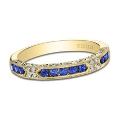 Breathtaking natural blue sapphire gemstones are nestled by quartets of brilliant round diamond accents in this extraordinary women's wedding band 18K Yellow Gold Diamond accents Natural blue sapphire Delicate milgrain detail and exquisite filigree patterns line the top and profiles to complete the look From the Kirk Kara Collection Elegant Sapphire Ring With Diamond Side Stones, Anniversary Sapphire Ring With Diamond Side Stones, Wedding Sapphire Diamond Ring With Single Cut Diamonds, Blue Single Cut Diamond Jewelry For Anniversary, Blue Jewelry With Single Cut Diamonds For Anniversary, Luxury Royal Blue Sapphire Ring For Wedding, Luxury Multi-stone Sapphire Wedding Ring, Luxury Multi-stone Sapphire Ring For Weddings, Wedding Sapphire Ring With Diamond Side Stones