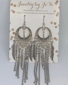 These boho earrings are made with antique silver feathers and chandelier connectors, with stainless steel (non-tarnishing) chains. They hang on silver French wire earring hooks.  They're so boho chic & fabulous! Silver Nickel-free Dangle Tassel Earrings, Silver Nickel-free Drop Tassel Earrings, Silver Dangling Charms Earrings For Festival, Silver Festival Earrings With Dangling Charms, Silver Bohemian Tassel Earrings With Dangling Beads, Bohemian Silver Jewelry With Dangling Charms, Bohemian Silver Tassel Earrings As Gift, Bohemian Silver Tassel Earrings, Silver Bohemian Tassel Earrings As Gift