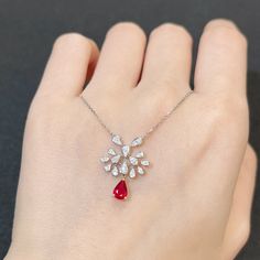 Gemstone Weight:0.46ct  Color: vivid red Clarity: really good . nearly flawless-minor inclusion Cut: great cut ; high brilliance Length: 40-45CM Total Weight:2.9 gram Dimension：center：4.4*6.3MM                        pendant:14.5*19MM Diamond: 0.16ct; H color , SI1 clarity Metal: 18K solid white gold Red Round Cut Necklace For Anniversary, Red Diamond-cut Necklace For Anniversary, Red Necklace With Prong Setting For Wedding, Red Prong Set Necklace For Wedding, Red Wedding Necklace With Prong Setting, Fine Jewelry Ruby Diamond Necklace Brilliant Cut, Fine Jewelry Ruby Diamond Necklace In Red, Red Ruby Diamond Necklace In Fine Jewelry Style, Red Gemstone Diamond Necklace For Formal Occasions