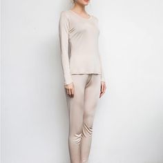 Free Shipping on orders $55+First Order 10 % OFF, CODE: DAISYSILKFREE Scrunchy or Eye Mask Gift on Orders $100+(No Code Needed) Daisysilk’s warm suit set will make lazy Sunday mornings a little bit more luxurious. Cut from pure mulberry silk, The relaxed fit, and an elasticated waistband ensure the trousers won't feel restrictive when you're sleeping. Warm Suit For Lady • Fabric: grade 6A mulberry silk • Neckline: traditional round collar• Sleeve type: long sleeves• Closure: pullover• Matching p Elegant Winter Loungewear Sets, Moisture-wicking Full Length Nylon Activewear, Solid Moisture-wicking Tights For Loungewear, Functional Full-length Moisture-wicking Leggings, Full-length Compression Seamless Legwear, Nursing-friendly Long Sleeve Cotton Sleepwear, Lazy Sunday Morning, Long Johns, Lazy Sunday