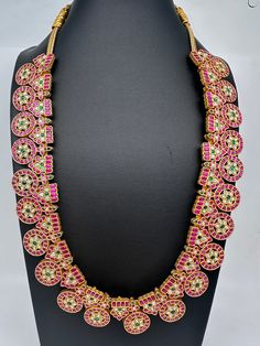 Jadau Kundan Traditional Bottu Mala Long Necklace with matching EarringsColor : GoldenSize : Necklae Length : 20 Inches; No EarringsStones : Jadau Kundan Pearls