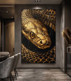 a snake painting on the wall in a dining room with chairs and a large table