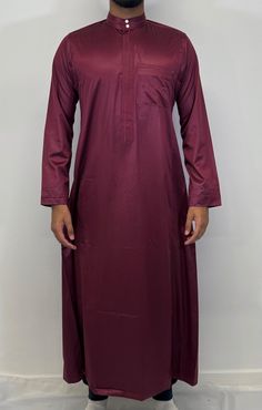 Introducing our Men's Embroidery Collar Thobe, the perfect addition to your Islamic clothing collection. Made from a high-quality mix fibre silky feel fabric, this thobe is not only easy to iron but also incredibly soft and comfortable to wear. The meticulous stitching make this thobe a truly stand-out piece. Available in a wide range of colours and sizes, you're sure to find the perfect fit for your personal style. And for the younger members of your family, we also offer this Saudi thobe in bo Red Embroidered Thobe For Eid, Traditional Red Long Sleeve Thobe, Red Long Thobe For Eid, Formal Long Sleeve Thobe For Eid, Embroidery Collar, Red Embroidery, Islamic Clothing, Early Fall, Mens Clothing