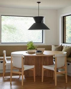 Before + After: This kitchen + dining remodel stuns with a total refresh, featuring our Anello Pendant—the perfect statement light to illuminate a dining nook. What's the first piece you need for your new year kitchen project? Design by @staffordhousestudio, photo by @lomillerphoto, styling by @_meandmo_, build by @marmocontracting