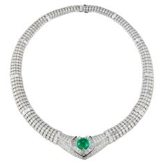 Certified Colombian Cabochon Emerald & Diamond Heart Shape Necklace 1 cabochon emerald set in the center surrounded by baguette & round cut diamonds 840 round cut diamonds and 87 baguette cut diamonds weigh approximately 60 carats Measurements: 15.25" diameter Gold Type: 18K White Gold Luxury Baguette Diamond Necklaces For Women, Luxury Emerald Cut Diamond Necklace For Women, Luxury Fine Jewelry Cabochon Necklaces, 1stdibs Jewelry, Emerald Diamond Necklace, Heart Shaped Diamond Necklace, Brides Jewelry, Emerald And Diamond Necklace, Heart Shape Necklace