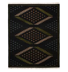 a black rug with multicolored diamonds on the front and back, in different colors