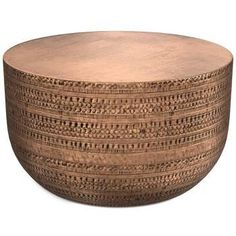 a large wooden bowl sitting on top of a table