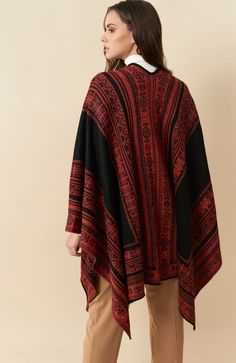 Gorgeous Alpaca poncho in beautiful earthy colors with colorful embroidered accents. Fully reversible, absolutely gorgeous, warm, and cozy. One size fits all, this poncho is quite stunning and will become your go-to garment. It is reversible, the same coloring, with different portions of color on each side. Fabric: 50% superfine Alpaca, 50% acrylic. Made Certified Fair Trade in Peru. One size fits all. Alpaca fiber contains very little lanolin, which makes it hypoallergenic and easier to tolerat Bohemian Black Winter Wrap, Winter Bohemian Black Wrap, Black Bohemian Wraps For Winter, Winter Embroidered Long Sleeve Poncho, Red Folk Style Poncho For Fall, One Size Embroidered Poncho For Fall, Embroidered One Size Poncho For Fall, Embroidered One-size Poncho For Fall, Embroidered Poncho For Fall, One Size