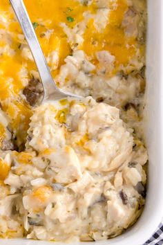 a casserole dish with meat and cheese in it on a checkered cloth