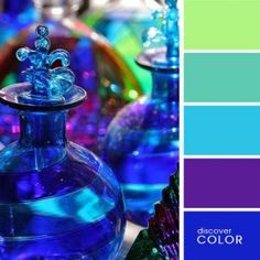 there are many glass vases with different colors in the picture and one is blue