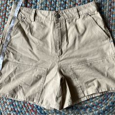 Never Worn Spring Beige Cargo Shorts, High Waist Khaki Cargo Shorts For Spring, High-waisted Khaki Cargo Shorts For Spring, Beige Utility Shorts For Spring, Beige High Rise Shorts With Pockets, Utility High-waisted Khaki Shorts, Forever 21 Cotton Bottoms With Pockets, Forever 21 High-waisted Shorts With Pockets, Forever 21 Beige Summer Bottoms