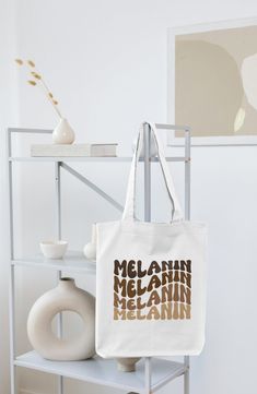 "A 100% cotton tote bag is the champion of durability, sustainability, and style.  .: Material: 6 oz./yd², 100% natural cotton canvas fabric .: One size: 15\" x 16\" (38.1cm x 40.6cm) .: Convenient self-fabric handles" Enhypen Polaroid, Decorated Tote Bags, Polaroid Love, Large Shopper Bag, Uni Bag, Chicken Lover Gifts, Personalized Baby Bibs, Cotton Canvas Fabric, College Bags