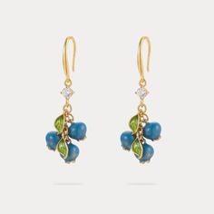 Indulge in the juicy and adorable design of our Blueberry Earrings. With their vivid and glowing appearance, they add a touch of liveness and a summer vibe to any outfit, making you feel like you're surrounded by the beauty of nature. Satisfy your fashion cravings and elevate your personality with these stylish earrings. DETAILS Plating: 18K Gold Materials: 18K Gold on Brass, Enamel, Cubic Zirconia Size: 1.65 "*0.59"(4.2c m*1.5cm) Weight: 7.3g Blueberry Earrings, Everyday Wear Jewelry, Astrology Jewelry, Astrology Necklace, Moon And Star Ring, Moon And Star Earrings, Fruit Jewelry, Detailed Necklace, Stylish Earrings