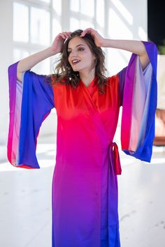 "Satin kimono dress with color transitions in purple and red Light and airy \"Wings\" sewn into the sleeves, which complement the airy image of the dress ➤ Features > dress length: 58,5 inches / 148cm cm ➤ Sizing My Size Guide in FAQ section below will help you define the perfect size match. The item can also be made according to your measurements - just message them to me. ➤ Delivery Your item is made-to-order and will be ready within 2-7 days. Average delivery times: > North America: up Vibrant Spring Dress With Kimono Sleeves, Red Long Sleeve Robe For Summer, Long Red Summer Robe, Red Long Sleeve Summer Robe, Red Dress With Kimono Sleeves For Party, Red Wrap Beach Dress, Red Summer Robe With Kimono Sleeves, Red Robe With Kimono Sleeves For Summer, Red Summer Robe For Vacation