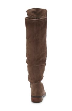 Ground a variety of looks with this leather boot that reaches over the knee and anchors you on a rubber sole. 19 1/4" shaft; 13 3/4" calf circumference 1 1/2" heel Pull-on style Leather upper/synthetic lining/rubber sole Made in Brazil Women's Shoes Wide Calf Suede Knee-high Boots, Knee-high Moto Boots With Reinforced Heel, Brown Suede Over-the-knee Boots, Brazil Women, Tall Boot, Knee Boot, Slouched Boots, Leather Boot, Designer Boots