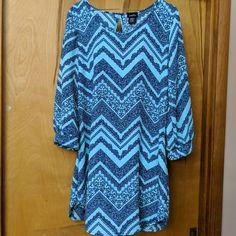 Pretty Dress From Rue21. Cute Keyhole Opening In Back. Colors Are Light Blue/Teal And Navy Blue Pattern. Never Worn! Blue Tunic Dresses For Day Out, Light Blue Casual Tunic Dress, Casual Light Blue Tunic Dress, Blue Tunic Mini Dress For Spring, Blue Tunic Mini Dress For Vacation, Rue 21 Dresses, Navy Blue Pattern, Patterned Dress, Pretty Dress