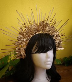 This one of kind gold crown is lightweight, durable and sturdy. Add to your photoshoot for a unique look or wear all night on New Years Eve, birthday , wedding or any special event. The perfect accessory to celebrate your inner goddess. Handmade crown , unique design.   Our Gold Halo Crown is made of zip ties, metal trinkets & faux flora hand painted in gold.  Your crown is 5 inches (13 cm) above your head at its height. The size of this headdress is universal for adult person. It sits soft and comfortable on the head for all night or all weekend wear ;) Ready to ship in 1-3 business days. All products will be shipped & tracked by USPS. Standard worldwide delivery time 3-12 days. Fast delivery 2-6 days. Each item is in a free gift box. You don't have to worry about presentation of your gif Queen Headpiece, Gold Halo Crown, Festival Crown, Handmade Crown, Halo Headpiece, Crown Halo, Headpiece Flower, Halo Crown, Crown Bridal