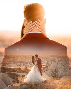 a man and woman are kissing in the desert