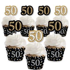 black and gold 60th birthday cupcake toppers with white frosting on each one