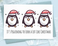 three penguins wearing santa hats on top of each other with the words it's penguining to look at like christmas