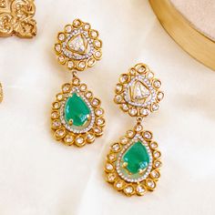 These earrings offer a sophisticated splash of color and a touch of elegance, making them a must-have accessory for any occasion! Vibrant hues of emerald, CZ and champagne stones blend seamlessly to create a captivating, aquatic-inspired design earrings. Approximate earrings length is. Gold-plated on high quality brass as base metal. Made by order. Kindly allow 5-7 weeks for the delivery of this item. For custom or urgent requests, please contact support@alacouture.com. *Please Note: We use faux stones and beads in all of our jewelry. Heritage Jewellery, Splash Of Color, Design Earrings, Waist Chain, Faux Stone, Head Accessories, Gift Card Shop, Base Metal, Men's Collection