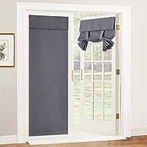 an open door with the curtains pulled back and window valances in front of it