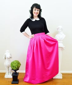 "This Pink Duchess Satin Ball skirt has the best feature ever...It swishes when you walk! The satin fabric is a shimmery thick, heavy handed matte duchess satin with just enough shine for formal events and just enough matte for dressing down with a tank or tee.  The skirt closes on the side with an invisible zipper. It is fully lined in a lovely light grey satin. The Ball skirt is available in three styles.   The Anne- gathered and full front and back shown in pink The Hartley- Three box pleats Pink Midi Skirt, Satin Ball Gown, Ball Skirt, Womens Beach Fashion, How To Make Skirt, Sparkly Sweater, Gown Skirt, White Striped Skirt, Duchess Satin