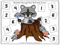 a number recognition roll and cover with a raccoon sitting on a tree stump