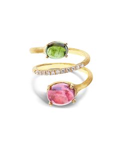 An ode to elegance that forces the rules, which rewrites shapes and details with refinement. A luminous rivière of diamonds that embraces an 18kt yellow gold spiral and culminates in two wonderful tourmalines, one pink and one green. A sinuous and sparkling dance to wear.DIAMONDS:- Weight (total): 0.15 CT- Clarity: VS- Color: G- Cut: roundNatural stones:- TOURMALINE Weight (total): 4.45 CT Formal Tourmaline Fine Jewelry Ring, Gold Tourmaline Ring Fine Jewelry, Luxury Gold Tourmaline Rings, Fine Jewelry Red Tourmaline Rings, Fine Jewelry Tourmaline In Pink, Spiral Jewelry, Spiral Ring, Green A, Tourmaline Jewelry