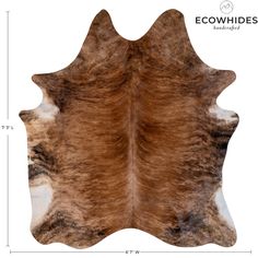 a brown and white cowhide rug is shown with measurements for the area around it