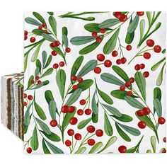 two napkins with red berries and green leaves on them