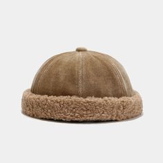 Make a statement in the colder months with our Shearling Brimless Hat – where luxurious comfort meets impeccable style. It's not just a hat; it's an embodiment of warmth and elegance. Key Features: Premium Shearling Construction: Experience the unmatched softness and warmth of genuine shearling. Our hat is crafted from premium shearling material, offering a plush and comfortable feel against your skin while providing insulation against the cold. Brimless Elegance: Embrace a sophisticated and dis Docker Hat, Cold Weather Attire, Fisherman Beanie, Brimless Hat, Skull Hat, Hip Hop Hat, Winter Hats Beanie, Winter Beanie, Dad Caps