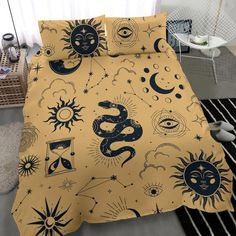 an image of a bed with sun and moon on it