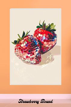 two red strawberries with green leaves on them sitting next to each other in front of an orange wall