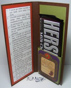 an open book with a candy bar inside